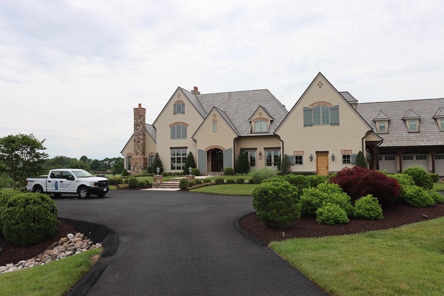 A home with a new front porch made of pavement