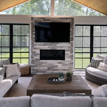 An outdoor fireplace with linear stone veneer for a slick, modern look.