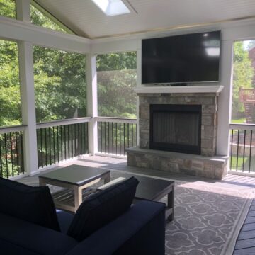 An outdoor gas insert fireplace for screened porches.